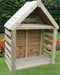 Wooden playhouse on a grassy area with flowers and bushes in the background